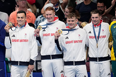 Britain's gold medal winners in men's 4x200-meter freestyle relay team